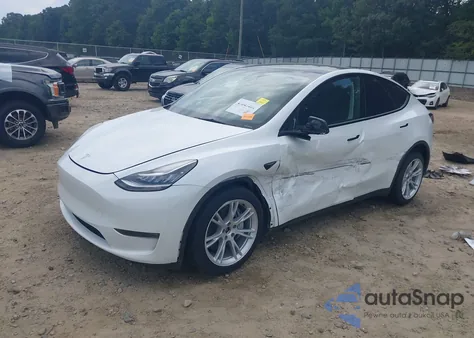 2023 Tesla Model Y Awd/Long Range Dual Motor All-Wheel Drive z USA, uszkodzony, nr VIN 7SAYGDEE8PA150850